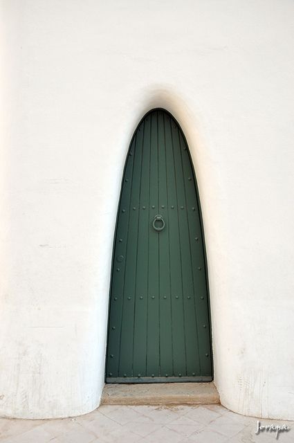 Narrow and tall arched door